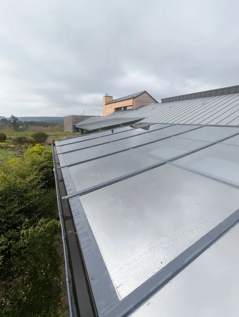 Toiture vitrée de véranda traitée par film solaire en pose extérieure, Morbihan